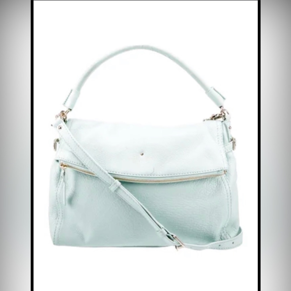 KATE SPADE in new condition